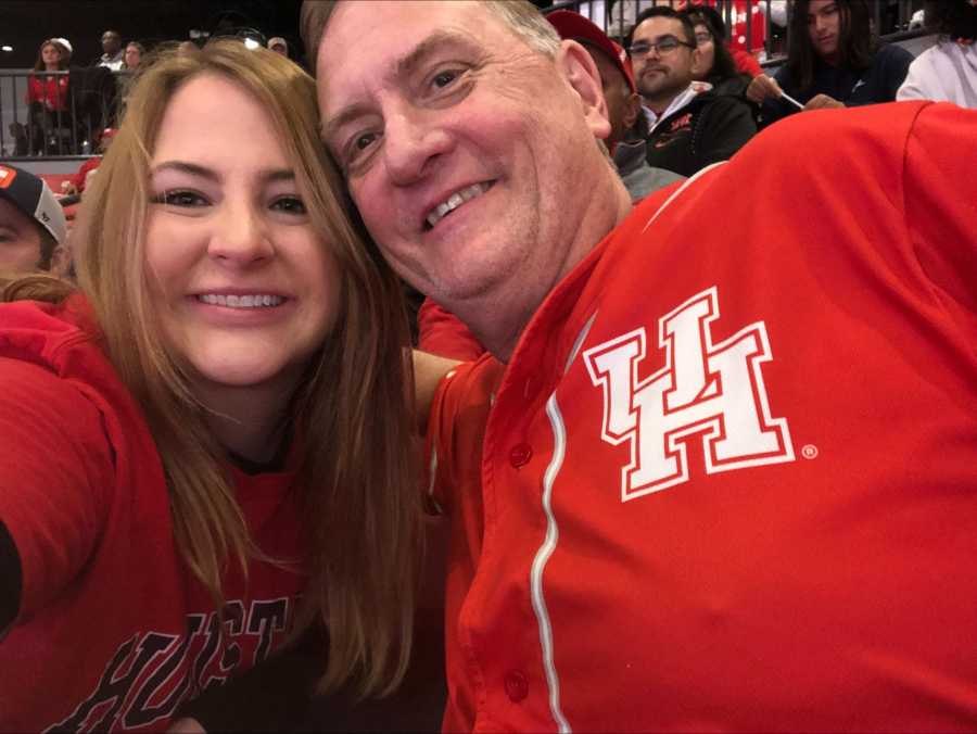 Lauren Draper and her father, Scott, at a UH game.