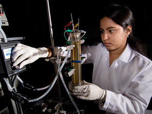 Environmental Engineering graduate student Archana Venkataramanan works with a electrocoagulation unit designed for drinking water purification research. Photo by Stephen Pinchback.