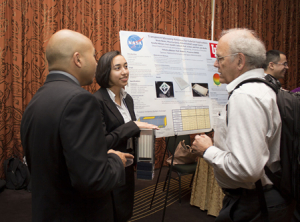 Students discuss projects at ECE Capstone Design and Graduate Research Conference.