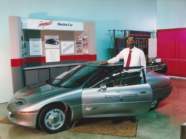 Kaushik Rajashekara with the first GM electric car, the EV1, in 1995.
