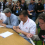 Electrical and Computer Engineering Professors (from left) Len Trombetta, Stuart Long, Valery Kalatsky and David Shattuck compete in the infamous Slide Rule Contest at the 29th Annual IEEE Chili Cook-Off. Photo courtesy of Loretta Herbek.