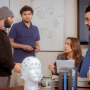 Rafiul Amin (left), Ph.D. graduate Dilranjan Wickramasuriya (left center) and Hamid Fekri Azgomi (right) speak with Rose Faghih (right center) about the MINDWATCH project. Amin and Fekri Azgomi gave a presentation on the research for the National Science Foundation's Cyber-Physical Systems (CPS) Principal Investigators' meetings from June 2 through June 4 in 2021.