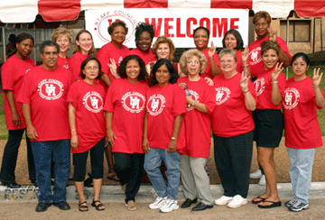 Engineering staff show their support at Cougar First Impressions. Pictured are (front row) James Andress, MyTrang Baccam, Mary Reed, Zaniffa Rose, Adele Rena, Sharon Gates, Dawnelle Prince and Lupe Pesina; (second row) Ursula Ollivierre, Shirley Mate, Jenny Ruchhoeft, Shirley Ray, Shelia White, Mary Schulz, Kim Jordan, Barbara Torres and Yvette Elder. Photo by Jeff Shaw.