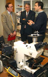 President Jay Gogue and Dean Ray Flumerfelt visit with Professor Peter Vekilov in his lab.  Photos by Mark Lacy.