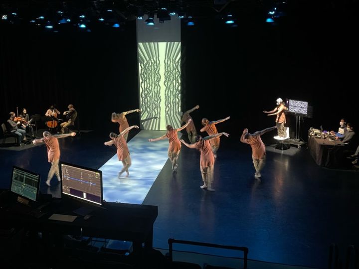 In dress rehearsal at the Wolf Trap performance, scientists from the University of Houston, at right, record the brain signals of the dancers. 