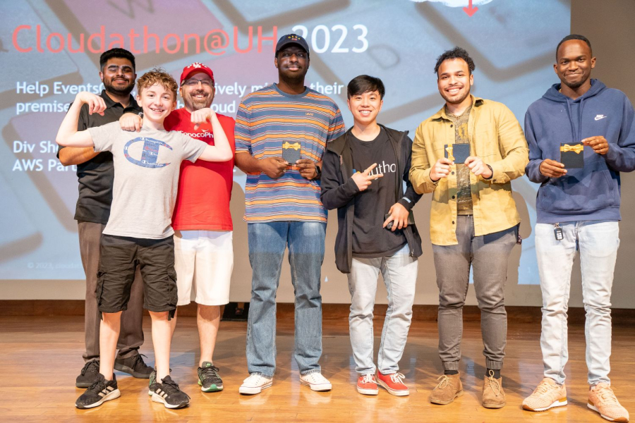 A group of young Cougars pose at the awards ceremony for the 2023 cloudathon@UH. 