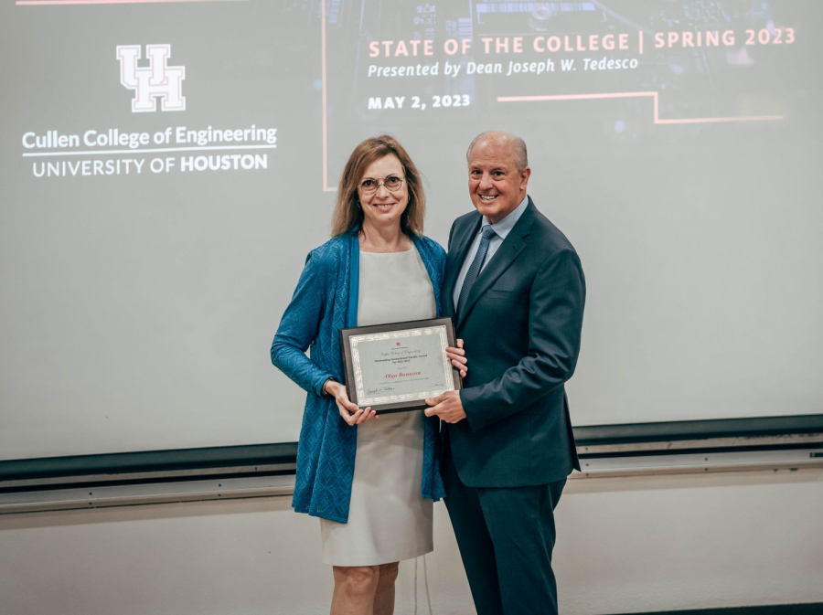 Olga Bannova, Research Associate Professor in the Mechanical Engineering Department, and Director of the Space Architecture Graduate Program, receives a Teaching Excellence Award from Dean Joseph W. Tedesco.