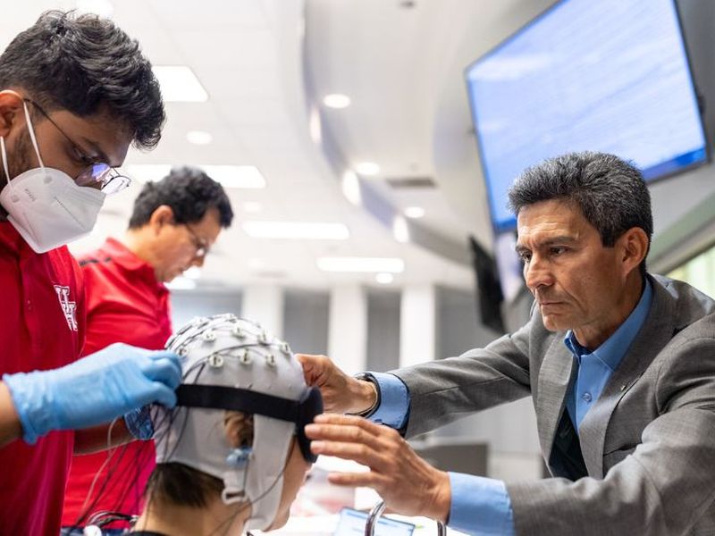 The UH Brain Center, supported by the U.S. National Science Foundation, allows research that would not be possible within the traditional silos of academic, industry, regulatory and clinical communities. At right, center director Jose Luis Contreras-Vidal prepares to map brain activity during a creative task.