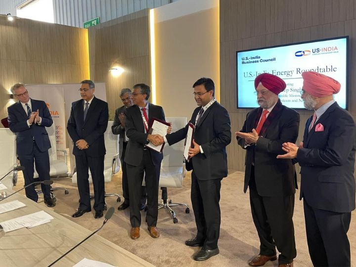 University of Houston's Dr. Ramanan Krishnamoorti shaking hands with representatives of India at the signing of the memorandum of understanding to establish the UH-DGH Data Center.