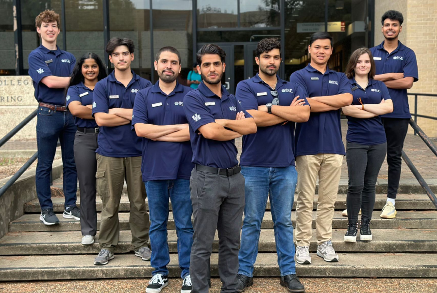 2023-24 IISE officers stand in front of the entrance to the Cullen College of Engineering