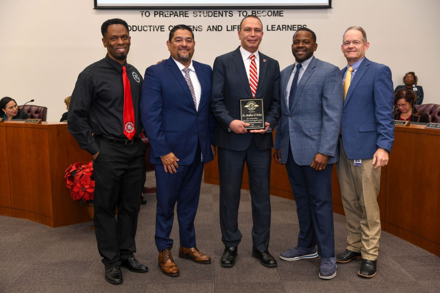 Medhat El Nahas [center] was recognized by Galena Park Independent School District and its Board of Trustees for his outstanding dedication to and support of their district and high schools.