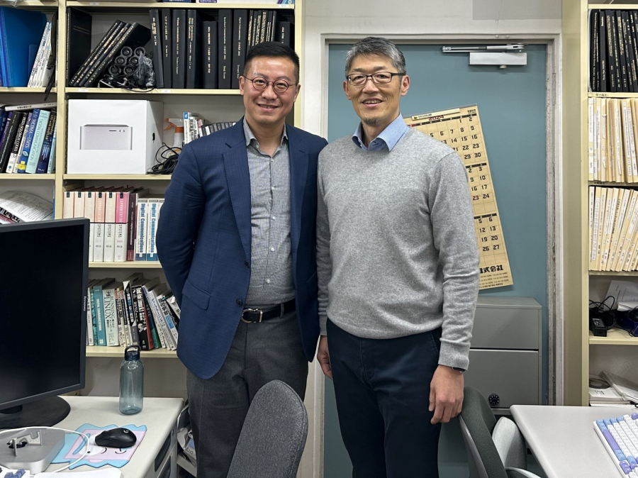 Miao Pan [left], associate professor in the Electrical and Computer Engineering Department, is co-PI for a collaborative research project with Tomoaki Ohtsuki [right], professor of Information and Computer Science at Keio University, Japan's most prestigious and first private institution of higher learning.