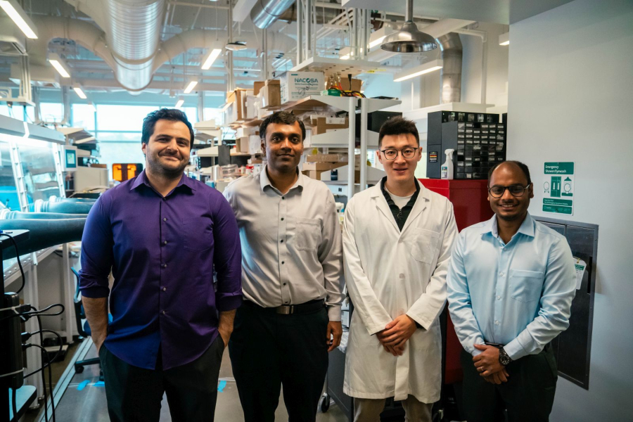 Rohith Reddy [second from left] poses with the researchers in his lab. 