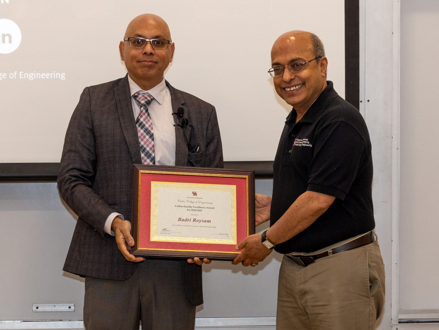 Pradeep Sharma and Badri Roysam, winner of the Cullen College of Engineering Faculty Excellence Award.