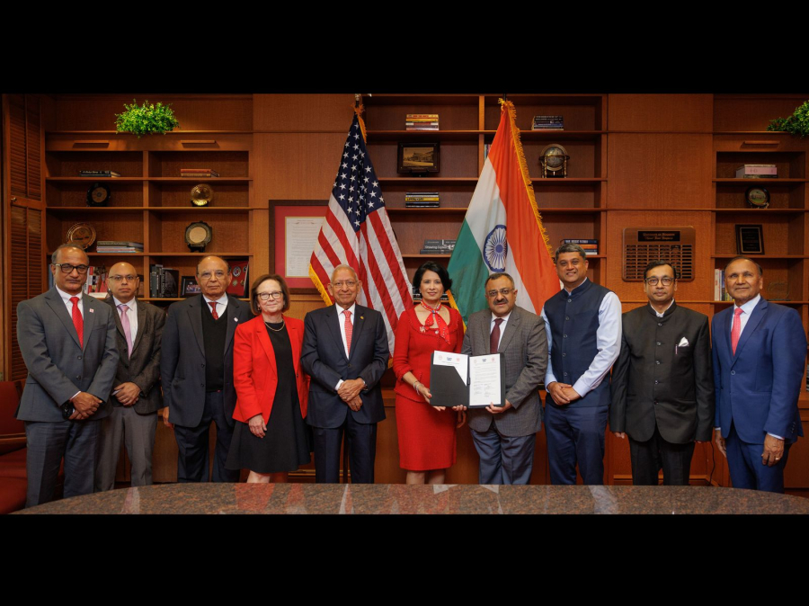 Officials from the University of Houston and the Delhi Technological University sign an agreement on March 20. 