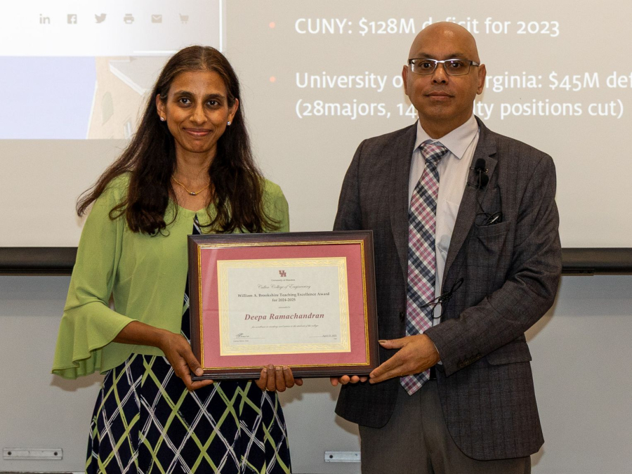 [Left] Deepa Ramachandran, Instructional Assistant Professor in the Electrical and Computer Engineering Department, receives the William A. Brookshire Teaching Excellence Award from Pradeep Sharma, Dean of the Cullen College of Engineering.