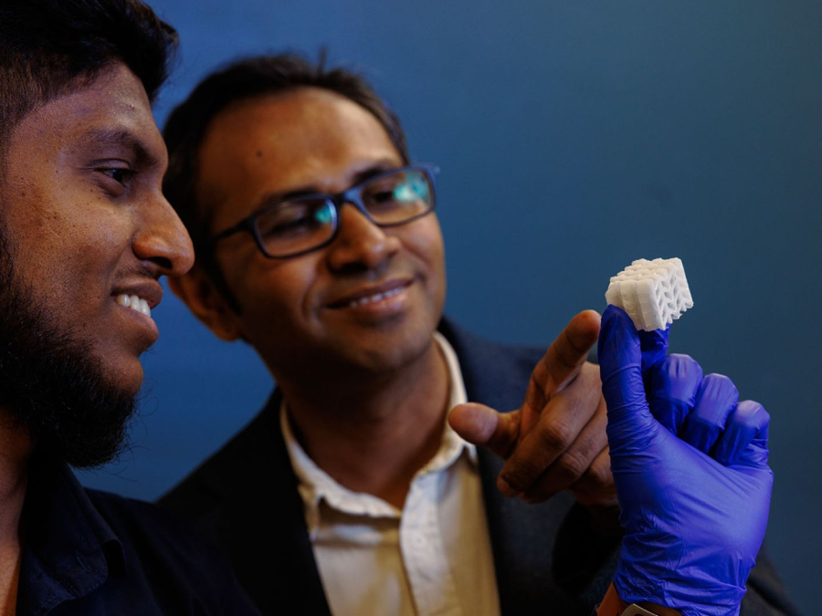 Postdoc Shajedul Hoque Thakur holds the bendable ceramic origami material, developed with assistant professor Maksud Rahman as part of the team’s research into bio-inspired sustainable composites.
