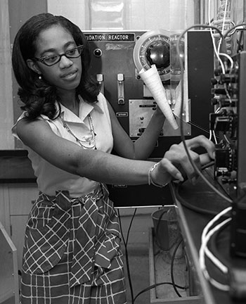 Coleman working on a chemical engineering experiment. Photo originally taken in 1971. Courtesy of Houston Public Library.