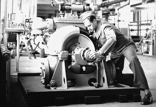 Lienhard visits MIT’s thermal engineering laboratory in 1953, and is intrigued by a then-already-outdated, single-stage, steam turbine. Photo by P. P. Roy Chaudhury.