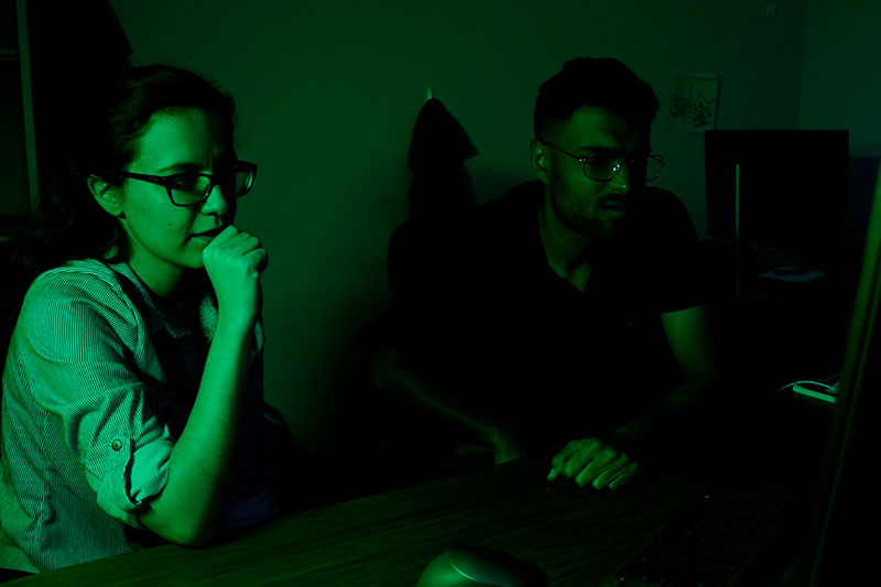 Gül Zerze and her graduate students conducting research in the lab.