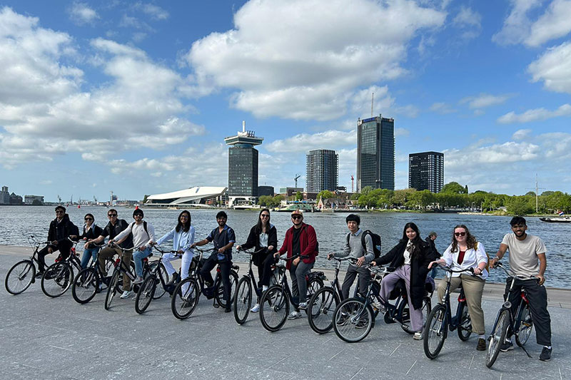 Dan Burleson, Alex Landon and undergraduate students in the Netherlands.