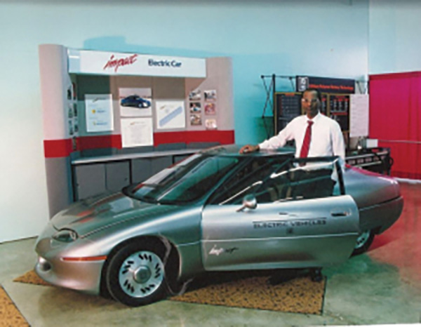 Rajashekara with the GM Impact electric vehicle in 1993