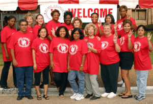 Engineering staff show their support at Cougar First Impressions. Pictured are (front row) James Andress, MyTrang Baccam, Mary Reed, Zaniffa Rose, Adele Rena, Sharon Gates, Dawnelle Prince and Lupe Pesina; (second row) Ursula Ollivierre, Shirley Mate, Jenny Ruchhoeft, Shirley Ray, Shelia White, Mary Schulz, Kim Jordan, Barbara Torres and Yvette Elder. Photo by Jeff Shaw.