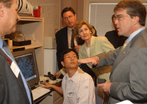 Sen. Kay Bailey Hutchison and Rep. John Culberson took a brief tour of a NanoHealth-related research facility at UH. Photo by Jeff Shaw.