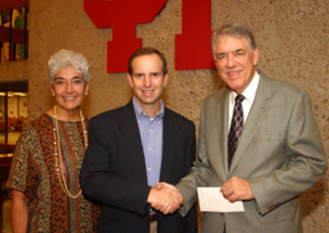 Gabe Cuadra (center), general manager of strategy and integration at BP, presents a check to Vita Como, director of the Engineering Career Center, and Raymond Flumerfelt, dean of the UH Cullen College of Engineering.
