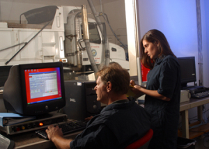 Steve Jeane and Rachel Muncrief are in the "command center" of the UH Diesel Vehicle Research and Testing Facility. Photo by Jeff Shaw.