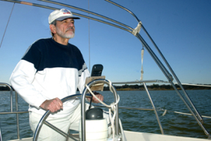 Fred Gentile (1961 BSEE) on his sailboat in Lake Grapevine, Texas. Photo by Jeff Shaw