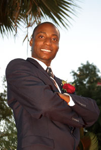 Okechukwu Ofili, mechanical engineering senior, was named UH Homecoming King during the half-time festivities of the UH vs. East Carolina football game. Photo by Jeff Shaw.