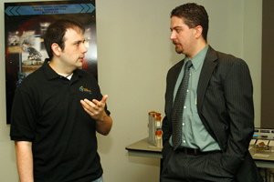 Chemical engineering senior Brian Daly discusses job opportunities at NASA with Jacob Collins (2001 BSChE). Photo by Jeff Shaw.