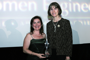Siddika Demir (1993 BSCE) accepts the Emerging Leaders Award from the Society of Women Engineers President Jude Garzolini at the organization's 2006 Award's Banquet held in Kansas City. Photo supplied by SWE.