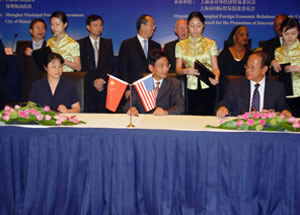 Electrical and Computer Engineering Professor Stephen Pei (seated far right) attends an official ceremony in Shanghai, China, along with Houston Mayor Bill White (back center), to sign a memorandum of understanding with the East China State University of Science and Technology and the Shanghai Jinshan District People's Government that may lead to cooperative research and educational efforts.