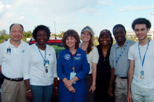 Mechanical engineering graduate student Sandra Geffert, center, is pictured with Astronaut Catherine "Cady" Coleman, and NASA Administrators Fellowship Program (NAFP) and Jenkins Pre-doctoral Fellowship Program (JPFP) participants, before the July 4 Discovery shuttle launch. From left: Dr. Jinping Yue, Essex County College, NAFP Cohort 7; Dr. Olufisayo Jejelowo, Texas Southern University, NAFP Cohort 5; Coleman; Geffert, JPFP Cohort 5; Dr. Melissa Green, Director, Division of Science and Technology Programs