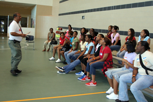 PROMES program manager, John Matthews, chats with a group of Wheatley High School students at the Step Forward kick-off event held at UH on Sept. 29. Students joined their mentors for an afternoon of math contests and challenges.  Photo provided by Kathy Zerda.