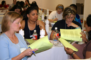 Engineering students (from left) Maebeth Stiglet, Tomica Henson, Brandy Jones and Vinita Kapoor attempt a problem-solving exercise at the WELCOME Retreat last month. Photo provided by WELCOME.
