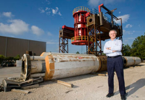 Benton Baugh (1967 BSME), adjunct professor of mechanical engineering and president of Radoil, Inc., has engineered a new tool to help secure the drilling riser on BP America's Thunder Horse during onset of a hurricane. Thunder Horse is the largest moored semi-submersible oil platform in the world. Photo by Thomas Shea.