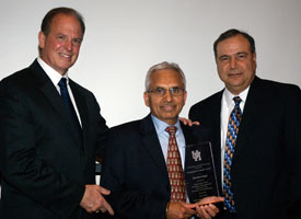 Dean Joseph Tedesco, Darshan Singh (1971 MSIE) and Hamid Parsaei, professor and chair of industrial engineering, at the Department of Industrial Engineering Awards Banquet. Photo by Gregory Bohuslav.