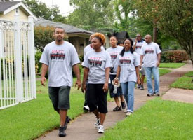 Volunteers and members from chapters of the National Society of Black Engineers participate in "A Walk for Education" to pass out information about college to underprivileged areas in Houston. Photo courtesy of NSBE.