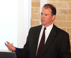Mark Finley, general manager of Global Energy Markets and US Economics at BP, presents statistical energy data to a group of Cullen College faculty and students on June 15. Photo by Pin Lim.