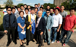 Graduate Tony Kim with his family and friends last Friday at the UH Cullen College of Engineering commencement ceremony. Photo by Tom Shea