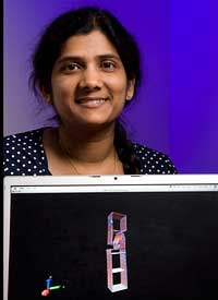 Yashashree Kulkarni shows off an example of her computational modeling, a technique she is using to improve on a new class of materials that could make metals stronger. Photo by Thomas Shea.