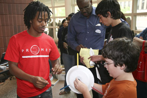 UH PROMES students assist Texas middle and high school students in testing their wind turbine designs.