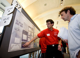 Mechanical engineering student Ethan Pedneau showcases his poster at the 6th Annual Undergraduate Research Day at the University of Houston. Photo by Thomas Shea. 