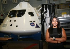 Aerospace engineering student Priyanka Cholleti with the Orion model.