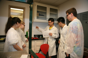 David Pineda, center, in the Laboratory of Energy Materials and Devices.