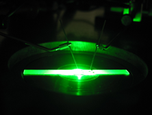 Mechanical engineering faculty member Jae-Hyun Ryou is researching ways to make LEDs more efficient at high current levels. Above is a green LED Ryou created as part of this research.