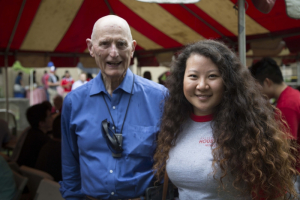 Ron Cambio stands with PROMES scholarship student at the PROMES 40th Anniversary Reconnect and Mixer.